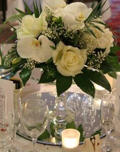 Centerpiece 104 - White rose , Gypsophila, Palm Leaves and Orchid . . . more