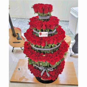 VIP Imperial – VIP Arrangement Of tiered roses and million stars . . .