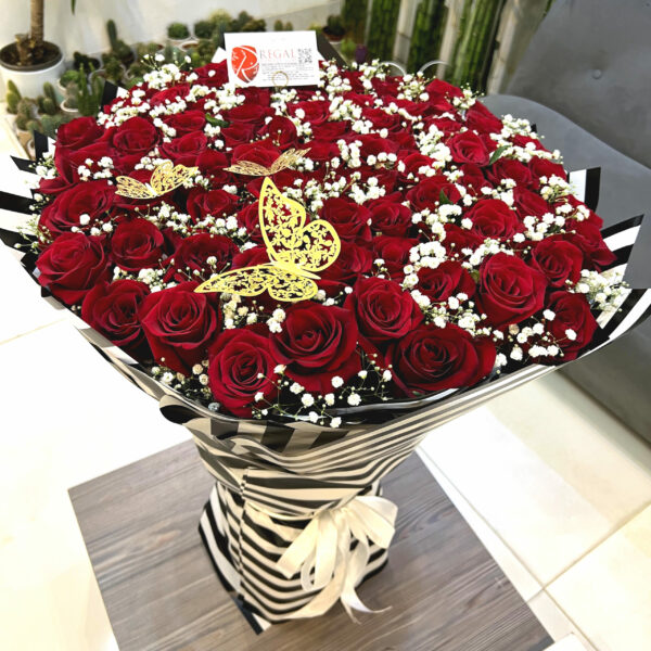VIP BY THE DOZEN RED ROSES - luxurious bouquet of red roses with million stars. . .