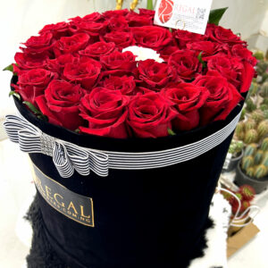 VIP THE ONE BOX ARRANGEMENT - Luxurious Bouquet of Roses With Contrasting Middle Rose. . .