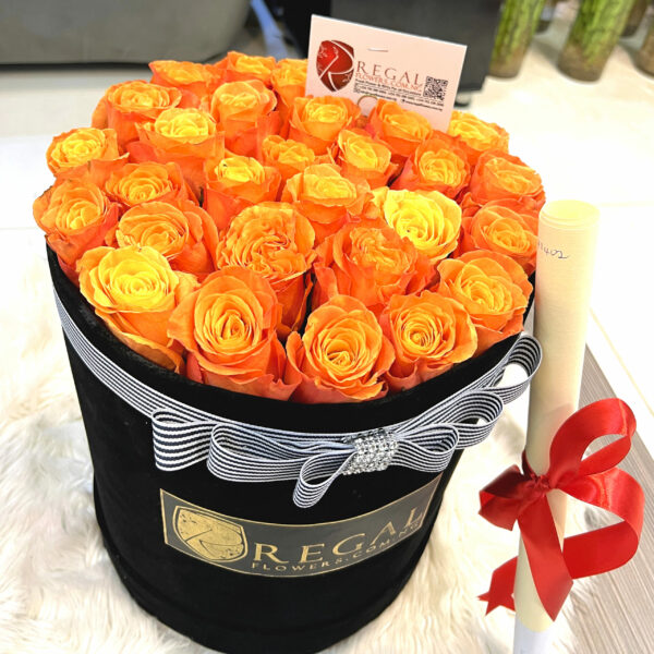 LUMINAIRE BOX ARRANGEMENT- Orange Roses in a box